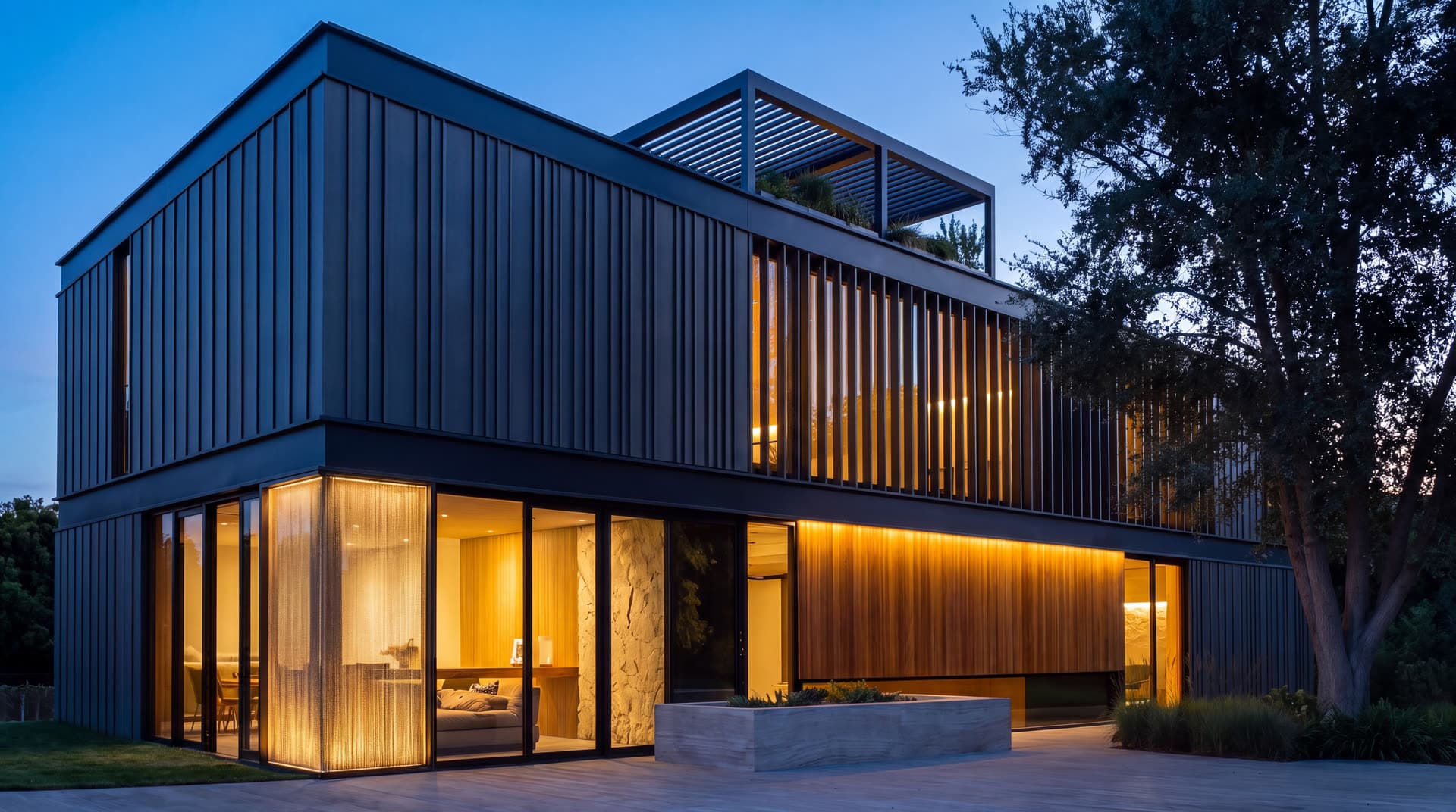 Contemporary house with aluminum-framed glazing at dusk